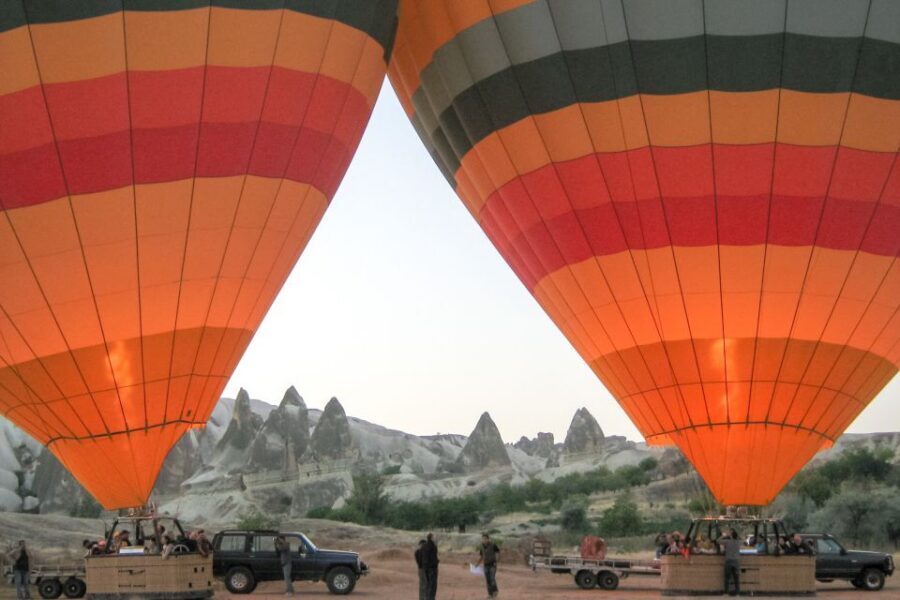 Cappadocia: Discover Sunrise on a Hot Air Balloon - The climb and the views: fairy chimneys, carved houses, and 3,000 feet of breathing room