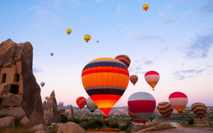 Cappadocia: Goreme Hot Air Balloon Flight Over Fairychimneys - Göreme at takeoff time: watching balloons inflate in the cold