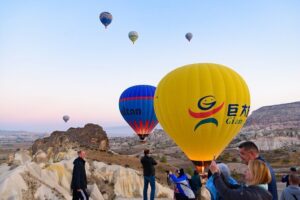 Cappadocia Sunrise Hot Air Balloon Watching Tour w/Transfer - The 2-hour plan: pickup, hills, photo stops, then back down
