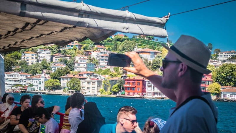 Istanbul: Bosphorus Sightseeing Cruise Tour with Audio Guide - Unwind on board: tea, Wi‑Fi, restrooms, and where to sit